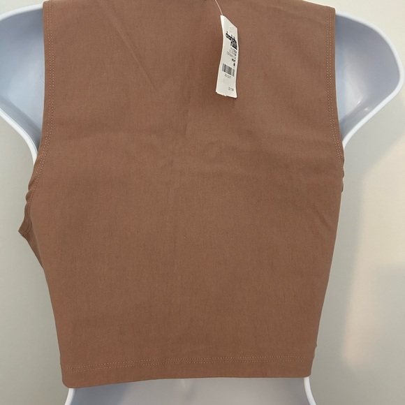 Mauve colored top and shorts.
Stretchy - Picture 6 of 12